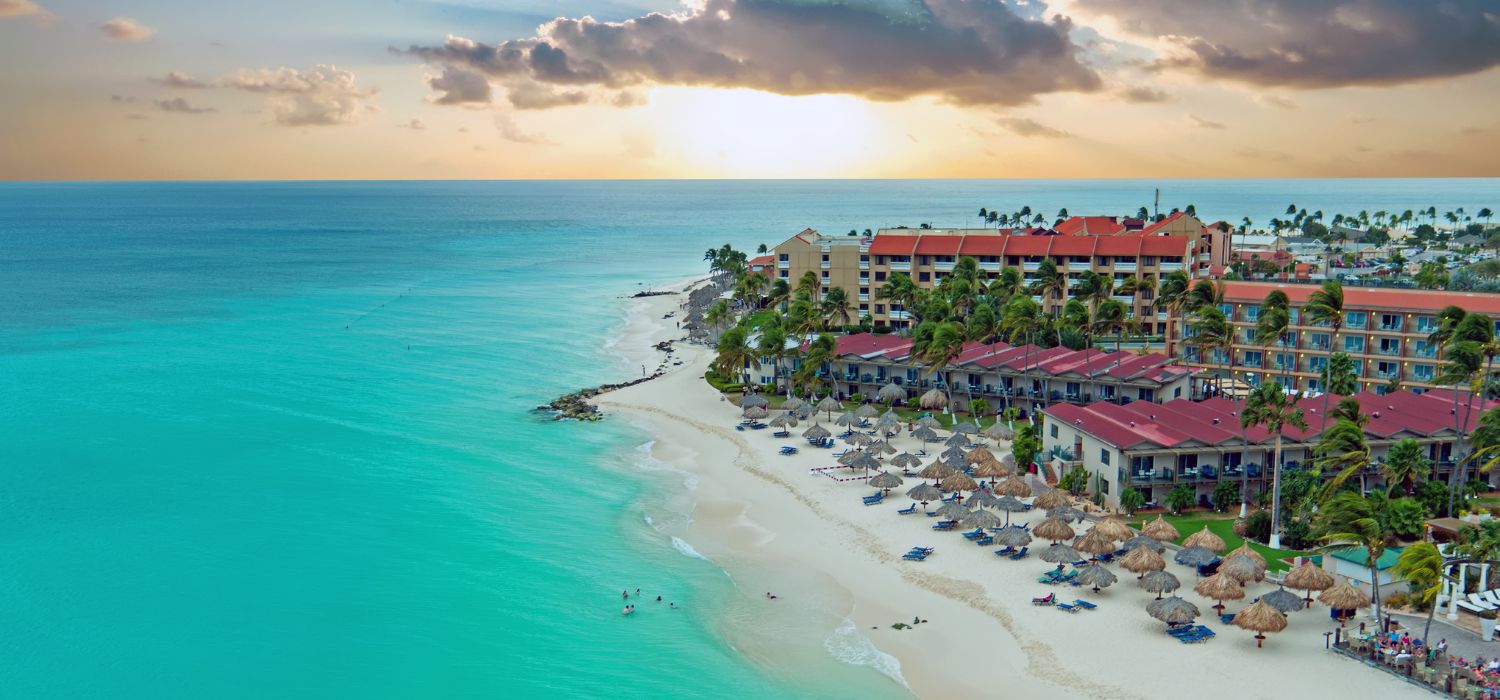 Aerial from Manchebo beach on Aruba island in the Caribbean at sunset