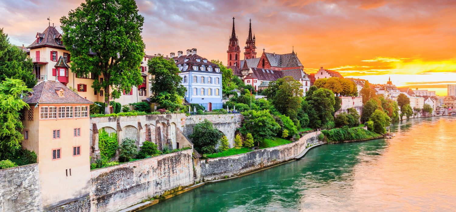 Basel, Switzerland. Old town with red stone Munster cathedral on the Rhine river