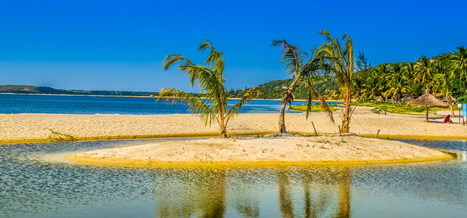 Bilene Beach Lagoon is a turquoise green beach, lagoon in Beautiful sunset Silhouette. Near Maputo Capital of Mozambique