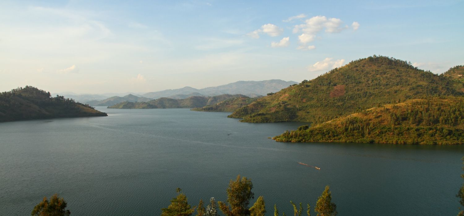 Lake Kivu set amongst rolling hills fading into the horizon in Rwanda, Africa